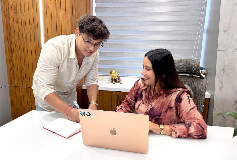 multicultural-professionals-analyzing-chart-at-sus